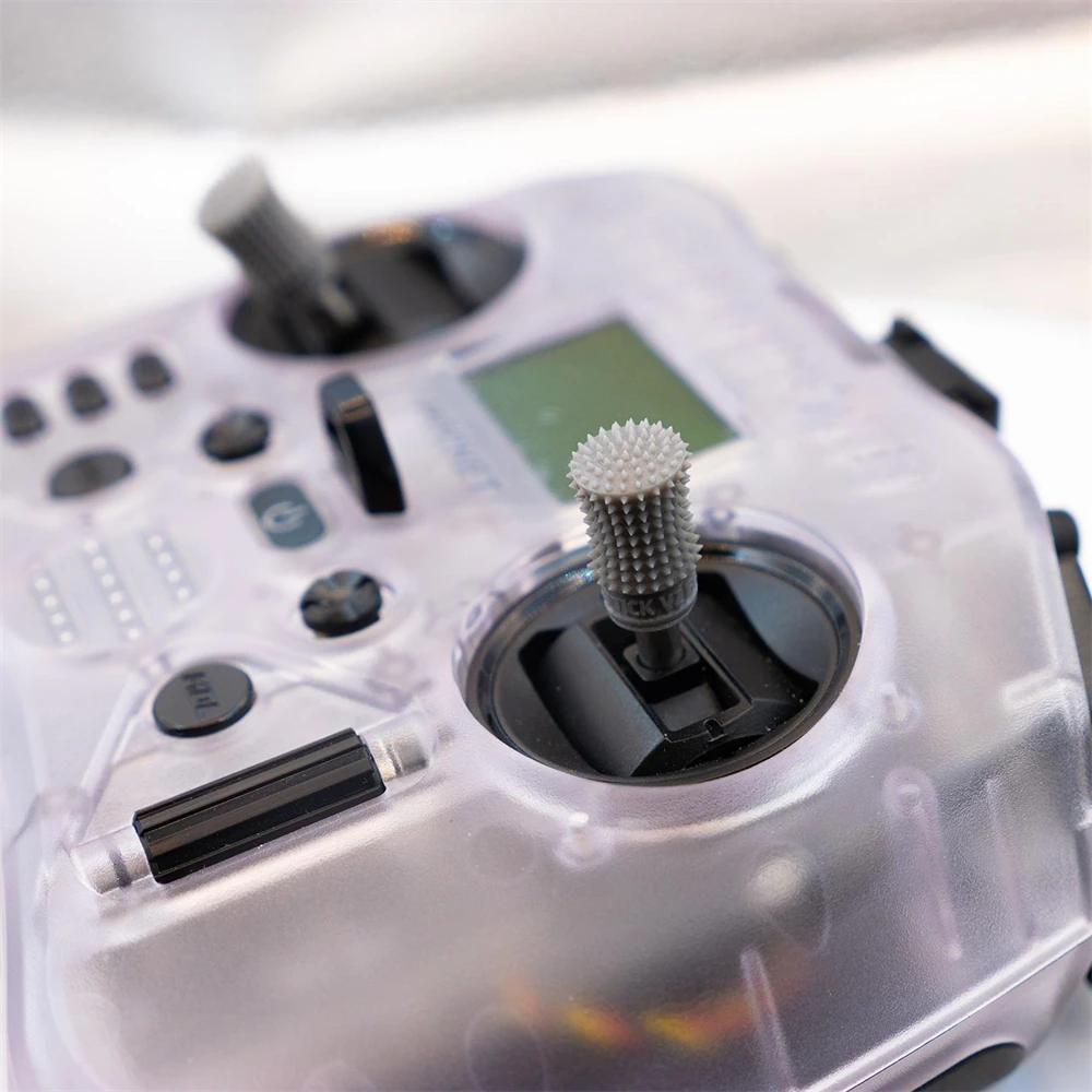 Détail des boutons et molettes de la radio ELRS pour drone FPV, achat rapide recommandé.