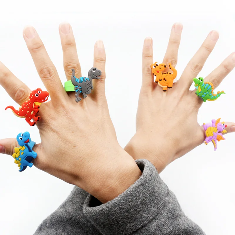 

6pcs Cartoon Dino Rubber Rings Dinosaur Theme Party Party Favors Happy Birthday Kids Toy Gift Tropical Jungle Party Decoration