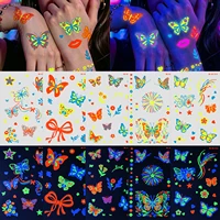 10 autocollants de tatouages temporaires néon UV, motifs variés (papillon, nœud, fleur, étoile, cœur), pour décorer le corps lors de festivals de musique et de soirées en club. 4