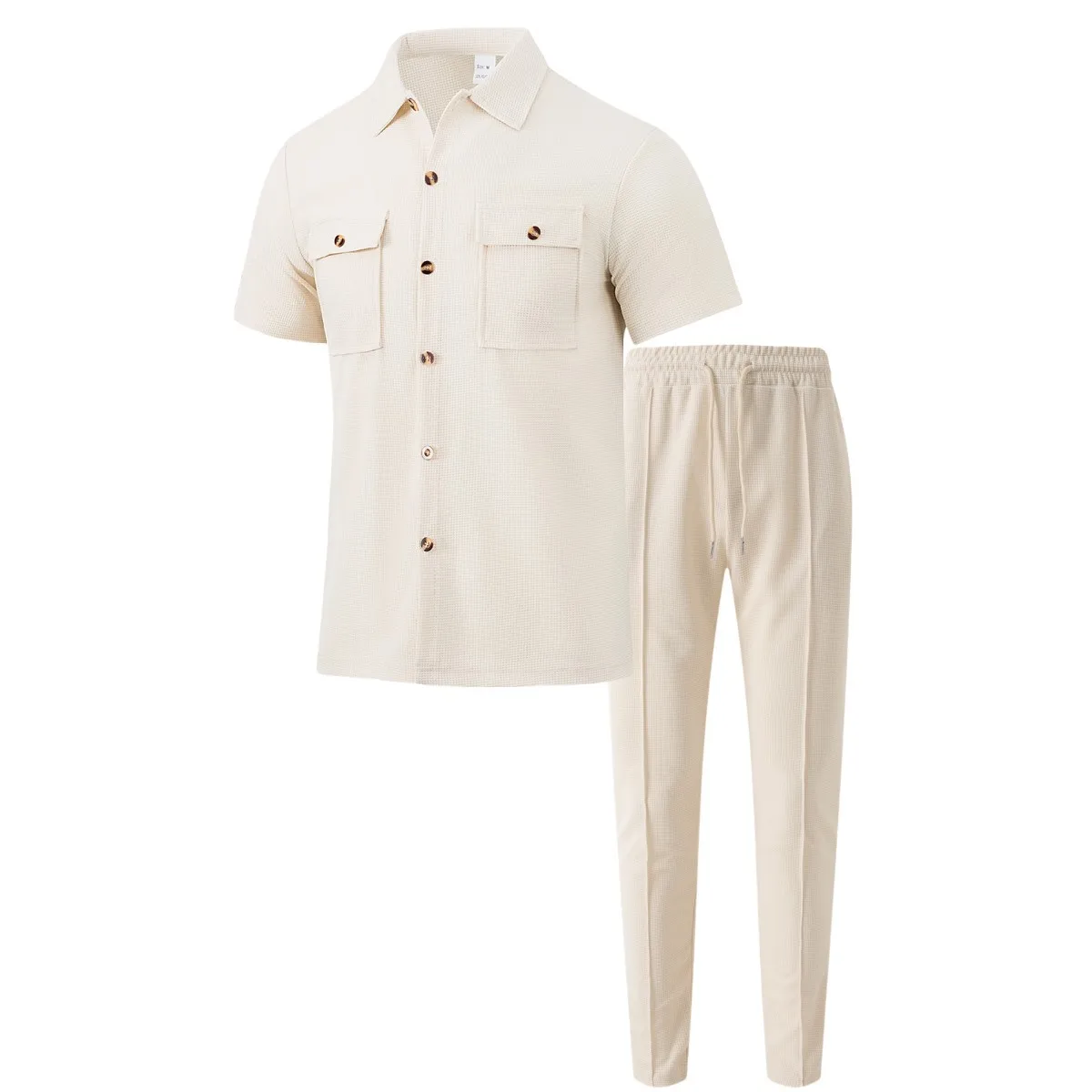 Men’s solid color waffle check short sleeve shirt and trousers two-piece set displayed on model in outdoor travel setting beige 2