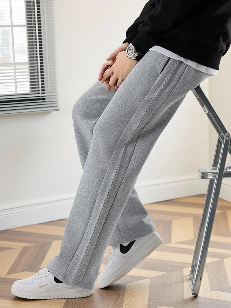 2025 Autunno Nuovi pantaloni sportivi in cotone pesante da uomo Tessuto strato d'aria di alta qualità Pantaloni sportivi dritti vestibilità ampia Pantaloni in maglia drappeggiati 1