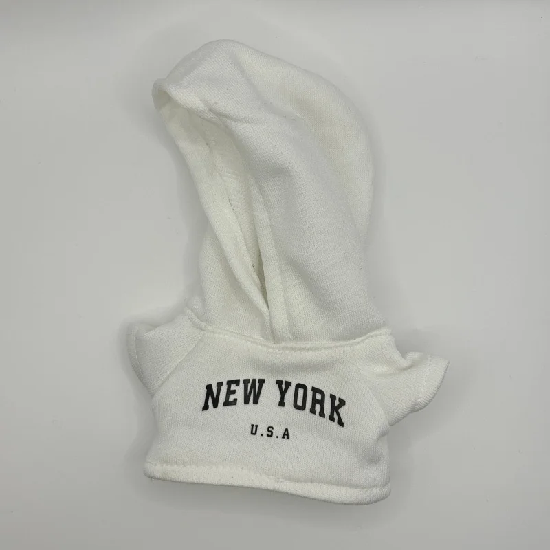 Stylish New York-Inspired Hoodie and Jeans Outfit with Glasses