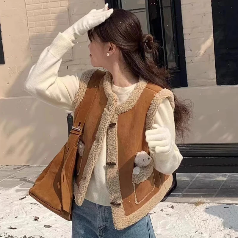 

Clothland Women Elegant Fur Waistcoat Sleeveless Horn Button Vest Thick Jacket Female Stylish Retro Coat Mujer MA129