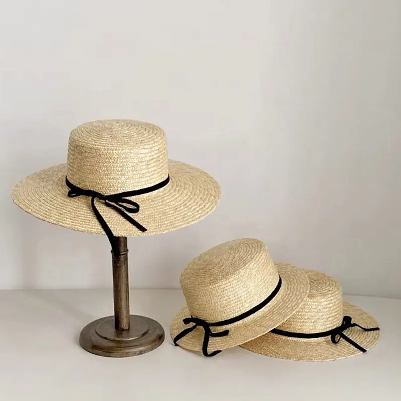 

Fashion Natural Straw Flat Top French Straw Hats For Women Covering Sun Protection Hat For Travel Bow Knot Sun Hat Designer Hats
