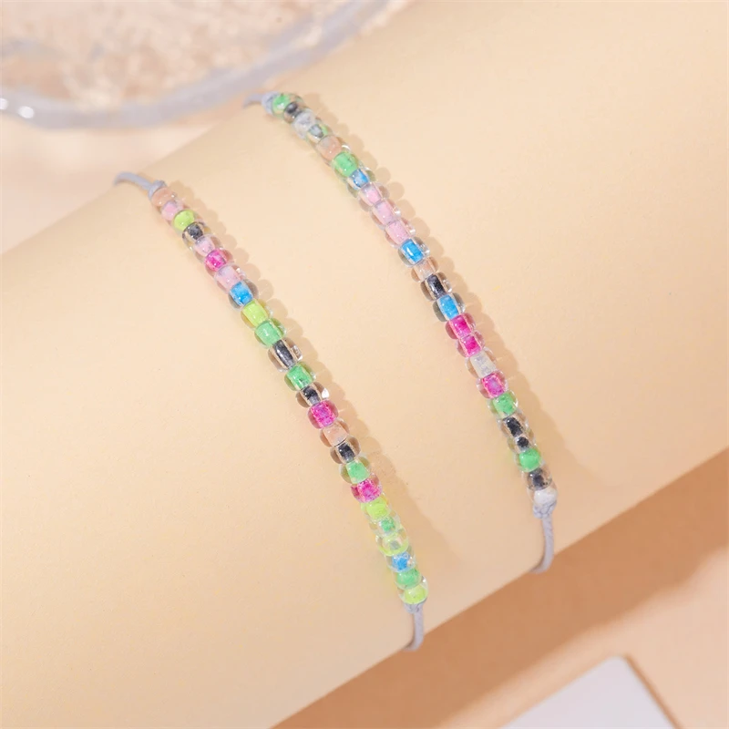2 teile/satz leuchtendes Armband für Frauen romantisches Leuchten in den dunklen bunten Perlen geflochtenes Seil Armband Paar Freundschaft Schmuck – Detail 12