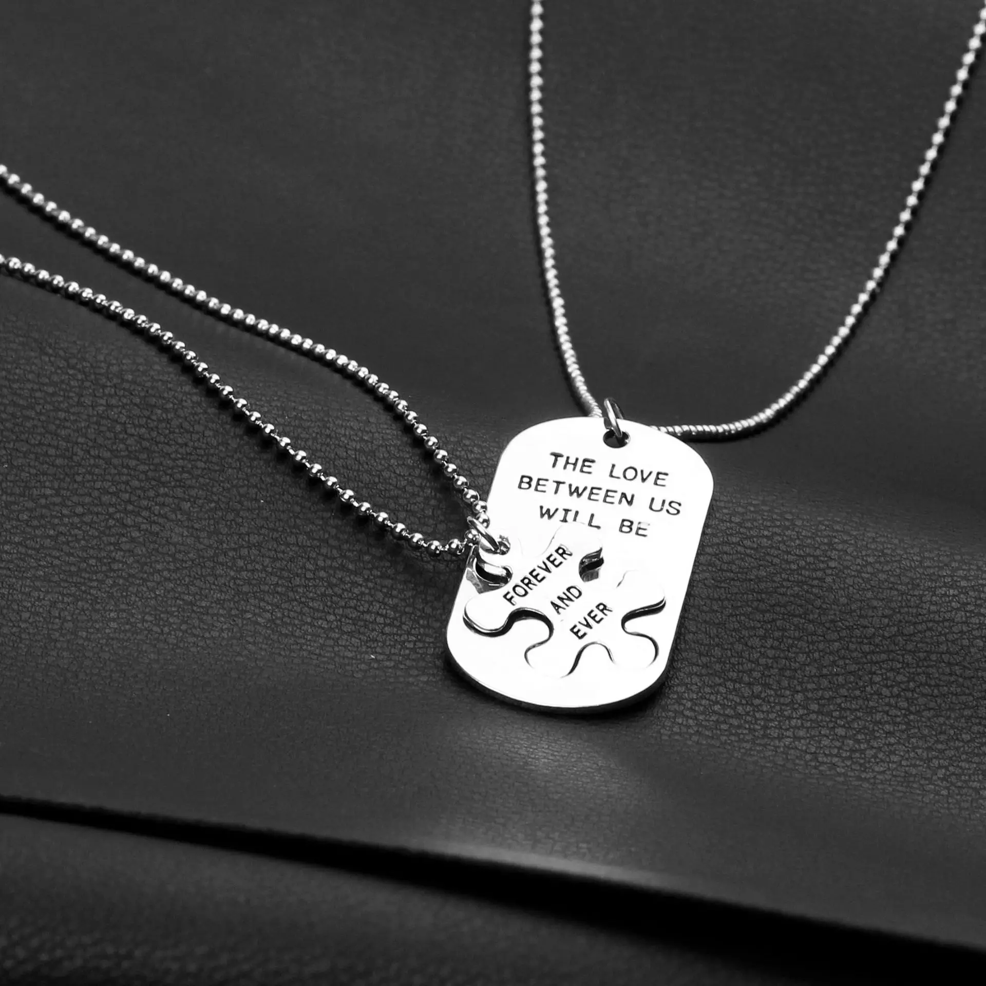 Silver finish puzzle Valentine necklace macro detail