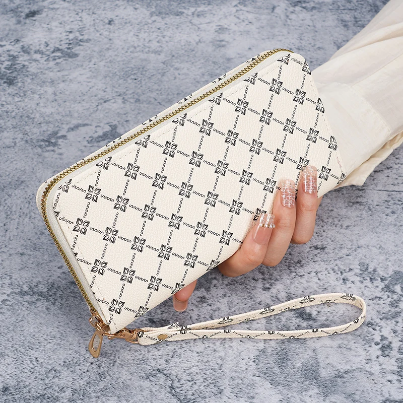 Large capacity multifunctional long wallet handbag with new print for sale.