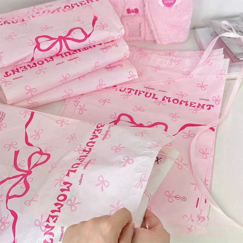 10Pcs 핑크 플라스틱 택배 가방 활 매듭 인쇄 특급 봉투 의류 포장 배송 봉투 자체 접착 우편 가방