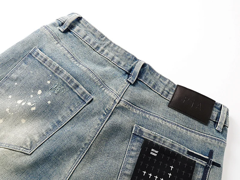 بنطلون جينز رجالي ضيق من ماركة RTA بتصميم ممزق ومزين بالرسم والجرافيتي، بنطلون طويل للشارع