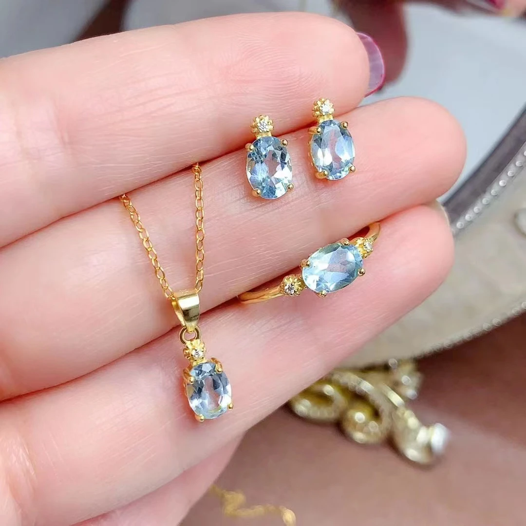 

Light Blue Natural Topaz Jewelry Set 5mm*7mm Total 2.8ct Topaz 925 Silver Ring Earrings and Necklace Pendant with Gold Plating