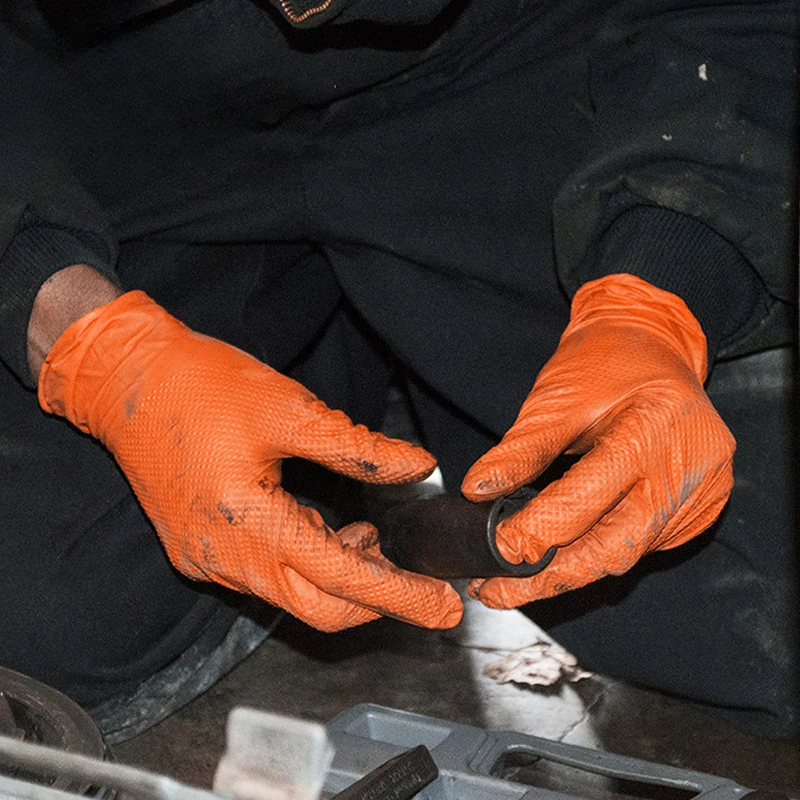 Gants nitrile jetables jaunes taille XL, boîte ouverte avec les gants visibles, étiquetage clair.