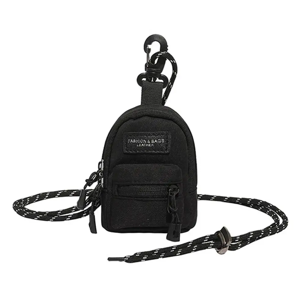 Mini portafoglio in nylon resistente con cerniera - Portamonete versatile, porta auricolari wireless e porta chiavi in nero