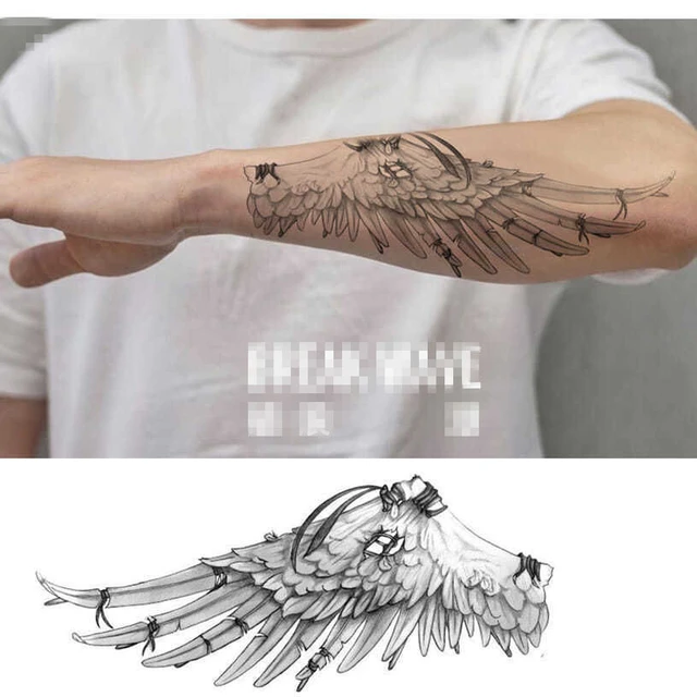 150 Divine Angel Wings Tattoos Ideas & Meanings - Tattoo Me Now | Forearm  band tattoos, Wrist tattoos for guys, Wing tattoo men