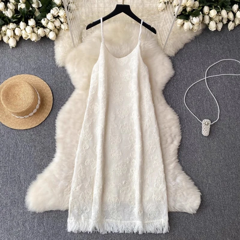 

Clothland Women Elegant Knitting Tassel Dress Spaghetti Straps Sleeveless Backless White Black Midi Dresses Vestido QD430
