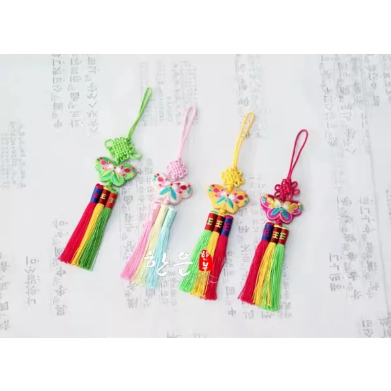 children s hairband bride s headdress girls korean original imported korean clothing hairdress embroidered pendant hairband Korean Original Imported Korean Clothing Embroidered Butterfly Colored Stripe Tassel Children's Pendant