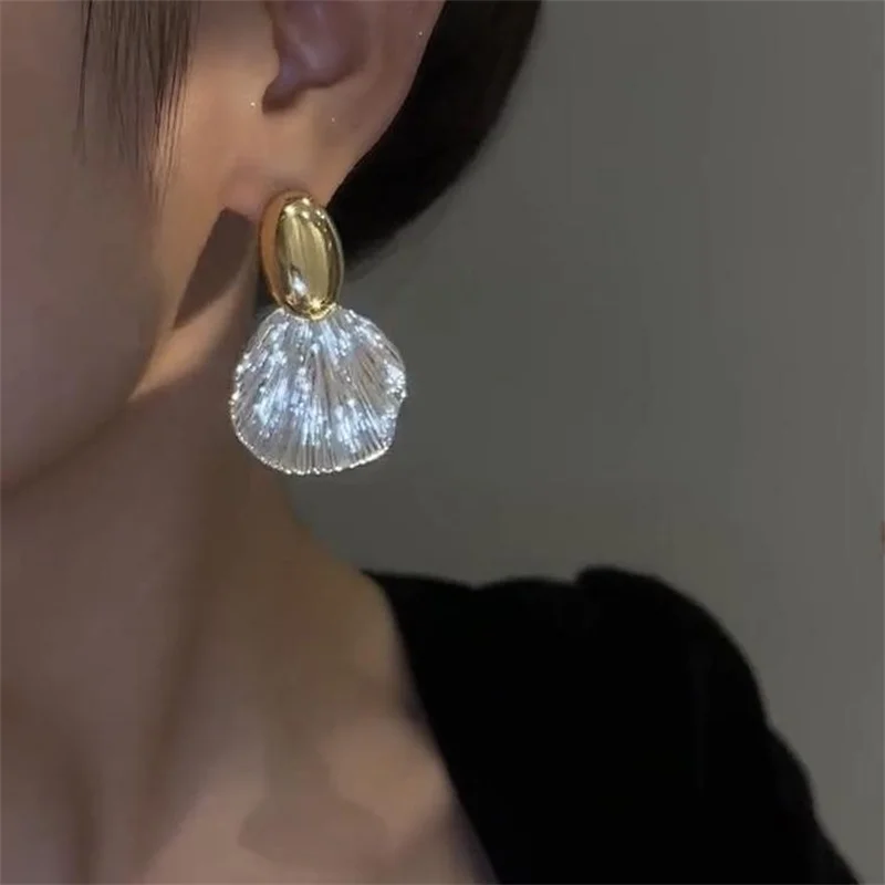 ピアス Big Shell Earring (Silver) Big Shell Earrings — SAGA Jewelry