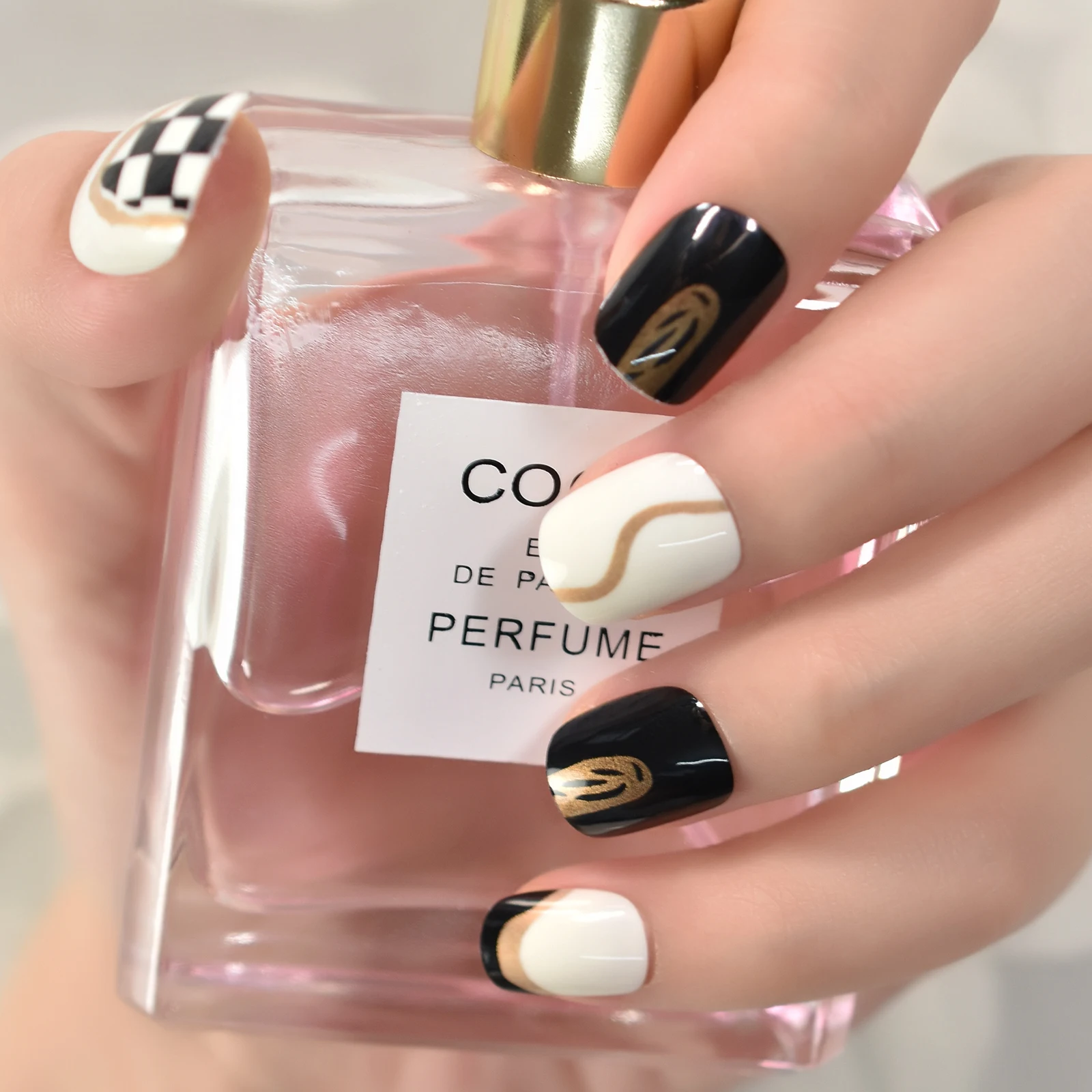 gold chanel nail art