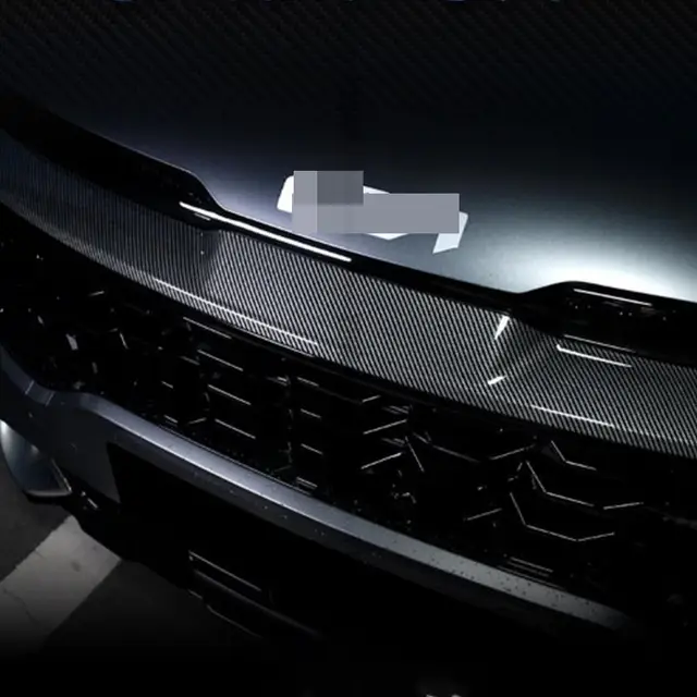 Invista em Estilo e Proteção com a Capinha de Grade Externa de Fibra de Carbono para Kia Sportage NQ5 2022-2023 3 Capinha de Grade Externa de Fibra de Carbono para Kia Sportage NQ5 2022-2023