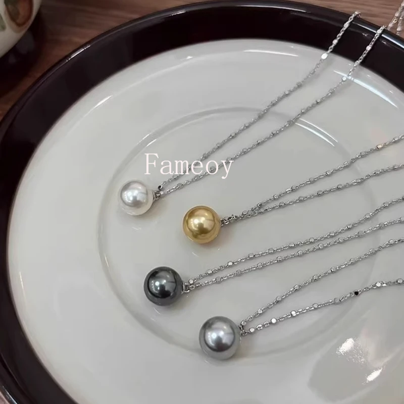 

2024 New Fashion Classic Circular Simulated Pearl Pendant Women's Necklace Earnail Set