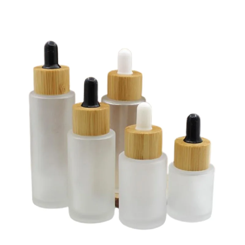 

10pcs Essential Oil Vials Empty Cosmetic Bamboo Wood Ring 20ml 30ml 40ml 50ml60ML Clear Frost Glass Flat Shouder Dropper Bottle