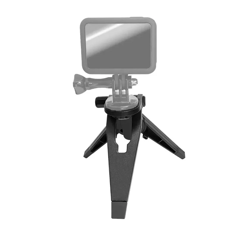 Trépied Pliable Portable Universel pour Appareil Photo Canon Nikon Sony DSLR, incliné sur une surface herbeuse en extérieur.