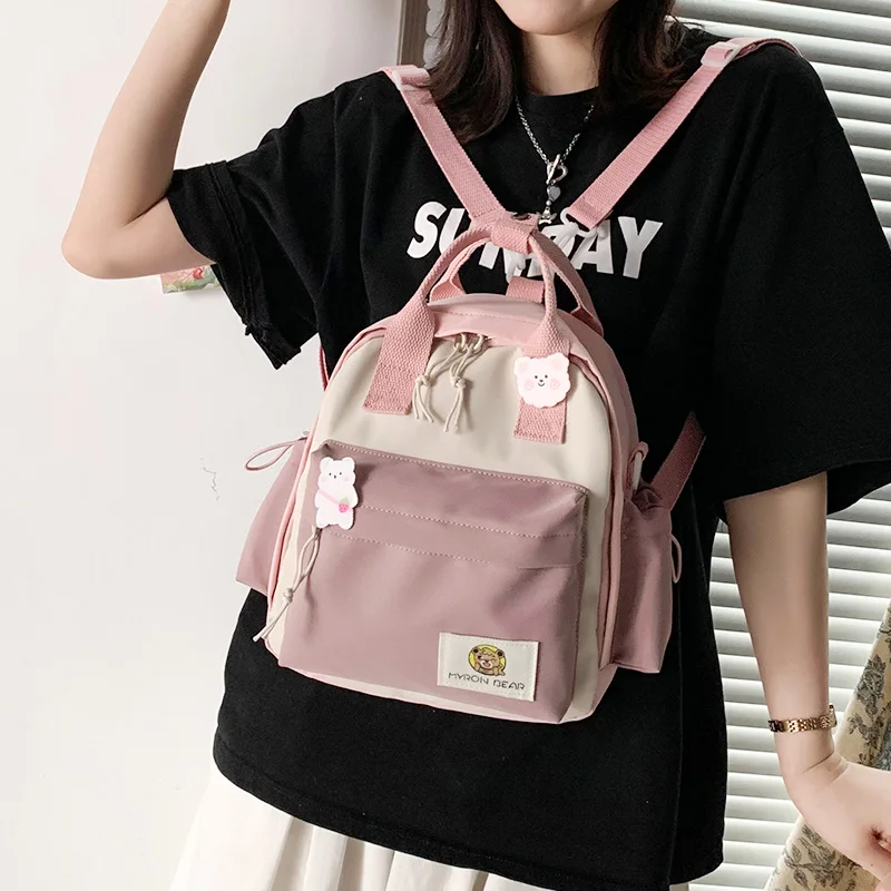 

2022Cute contrast color small backpack Mini schoolbags for school young female students Waterproof nylon travel backpack fashion