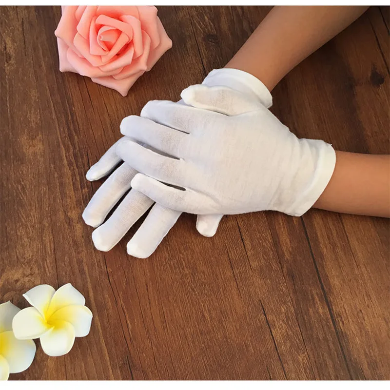 Guantes helanca en blanco para niño. Varias tallas