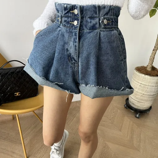 

Korean Dongdaemun vintage High waist two grain buckle side buckle wide leg loose show thin raw edge denim shorts women's ins