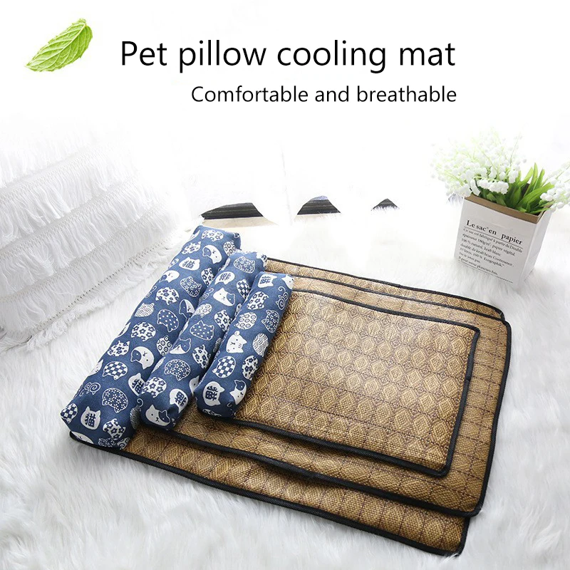 KittyNook Cat Co. Natural Rattan Cat Sleeping Mats in various sizes with blue pillow, shown on white beside a plant.