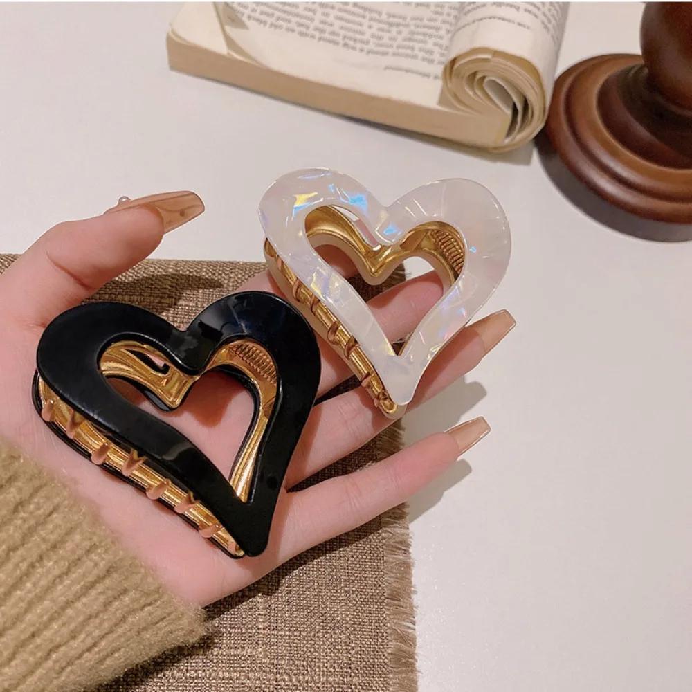 Description Picture 5 of itemY2k Love Heart Hair Claw Elegant Hollow Resin Ponytail Claw Clip Hair Accessories Kroean Style Geometric Shark Clip Girl