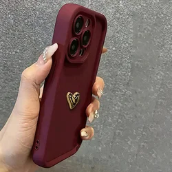 Elegant 3D Golden Heart Luxury Soft Phone Case for iPhone 15 (Wine red)