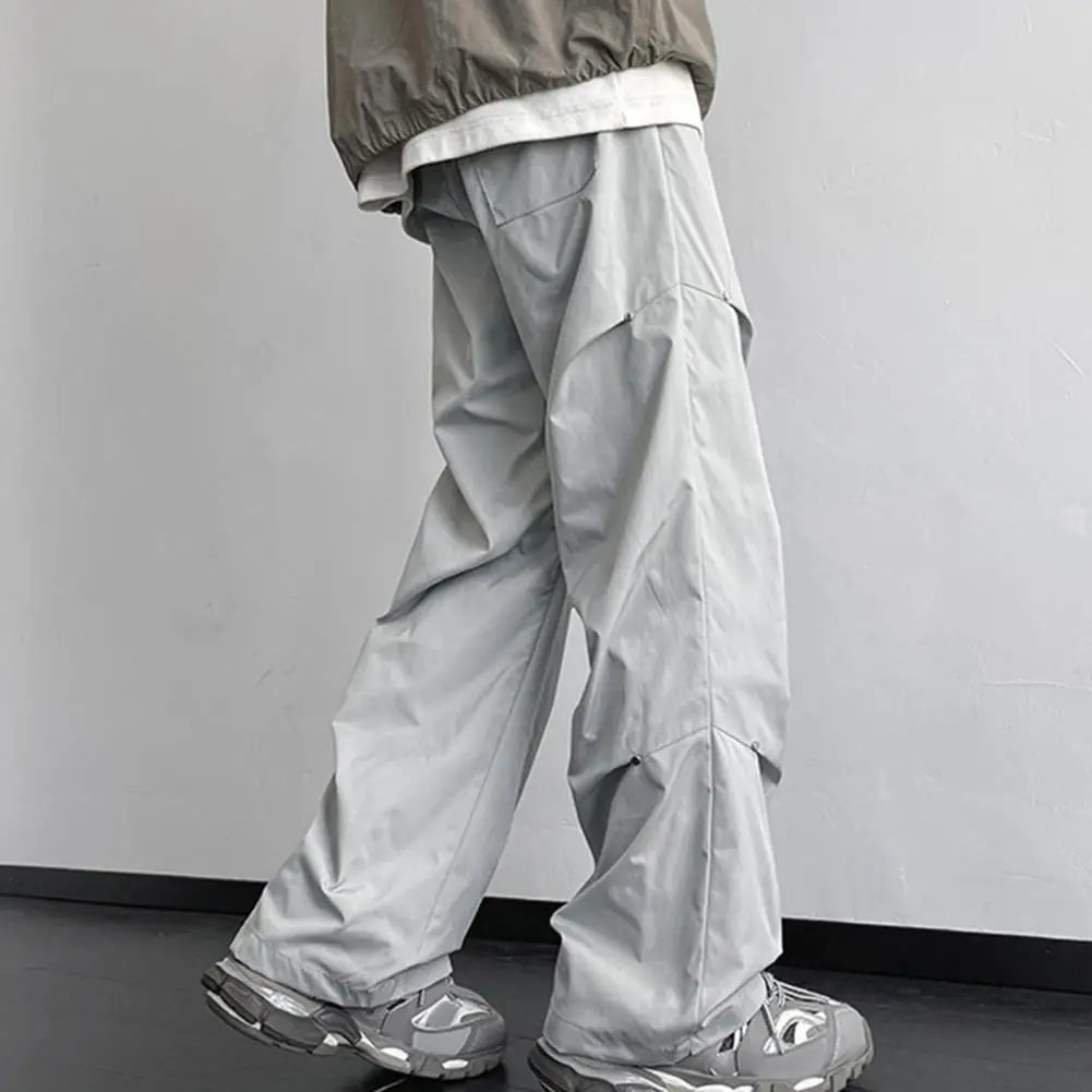 Description Picture 5 of itemSolid Color Men Trousers Men Straight-leg Pants Stylish Unisex Cargo Pants with Rivet Decor Wide Loose Fit for Streetwear
