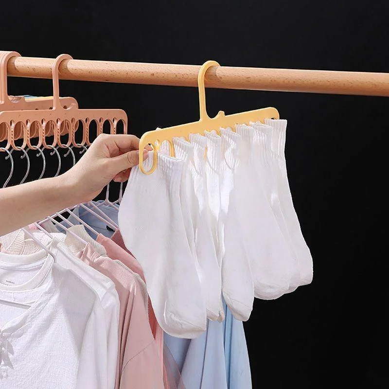 https://ae01.alicdn.com/kf/S7f98bf04ec114c69ac8dd2c0cae55bc7x/1PC-9-Hole-Clothes-Hangers-Organizer-Multifunctional-Hanger-Space-Saving-Wardrobe-Drying-Racks-Cloth-Storage-for.jpg