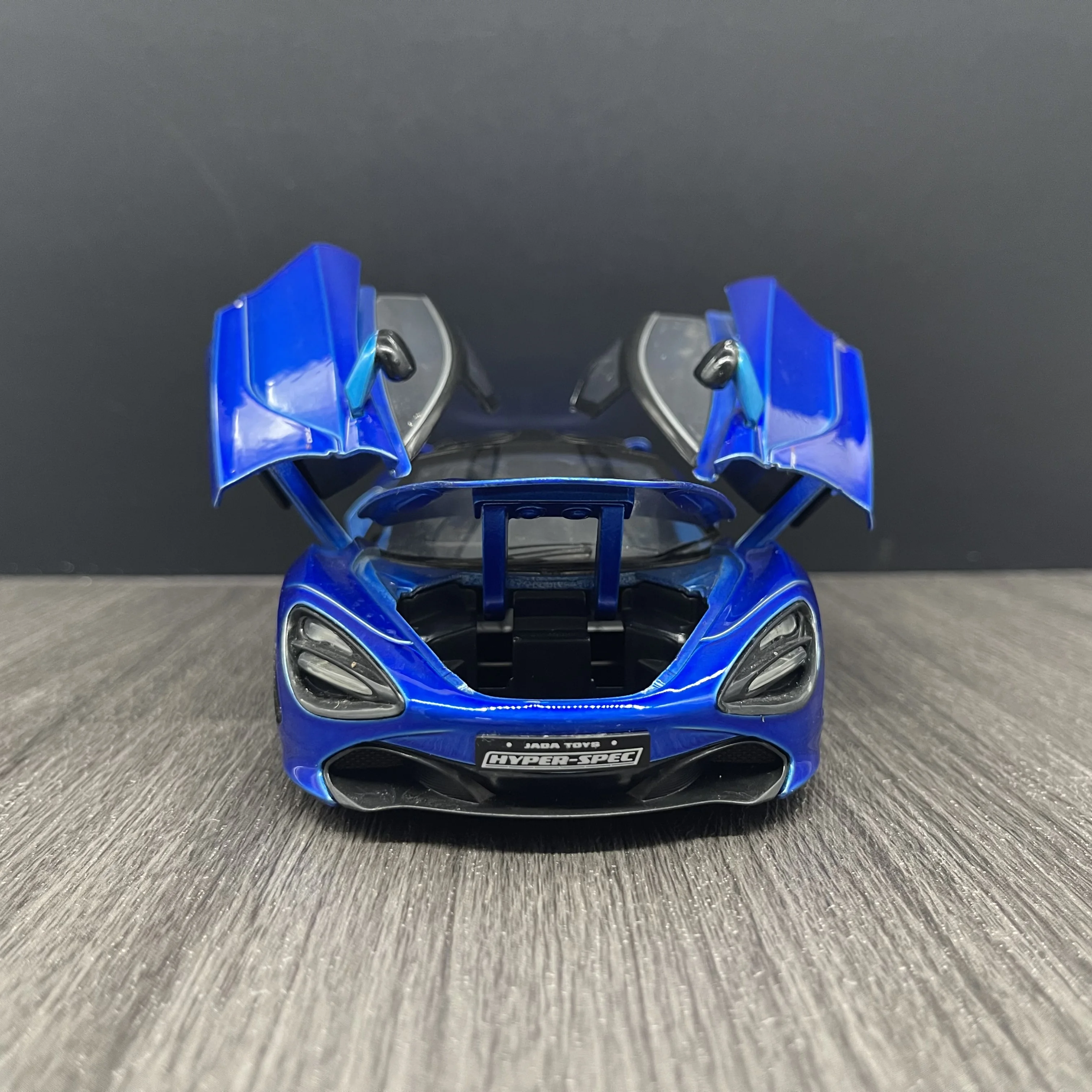 Фото Игрушка Jada McLaren 720S синяя и темно-синяя с черным топом 1/24 литая модель автомобиля игрушки для детей и взрослых №4