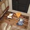 Cat: I won't fall! Durable and non slip entrance carpet for cat door mats, adding a playful charm to pet lovers' home decor