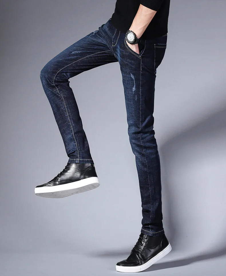 Jeans men's autumn and winter models 2022 new slim feet black tide brand winter men's trousers high-end slim jeans