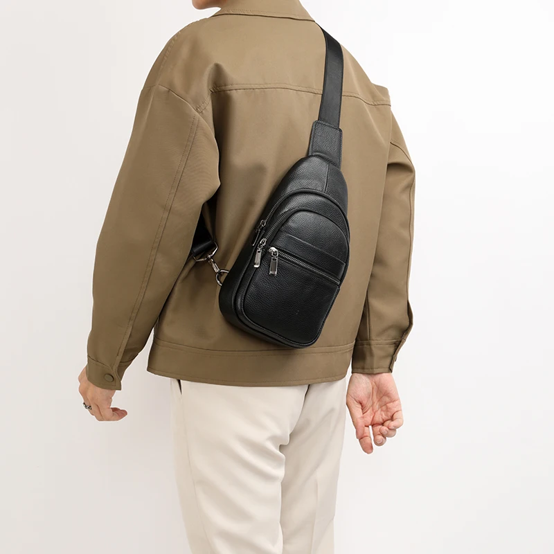 Stylish genuine leather sling bag for men with multiple compartments, ideal for everyday carry or travel