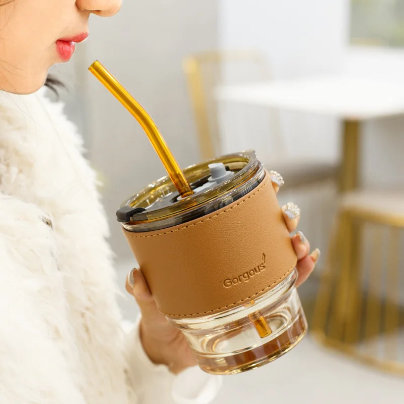https://ae01.alicdn.com/kf/S7fdb9ce2608843dfa0c90d7f734fd178u/Ins-Wind-New-Glass-Straw-Cup-Retro-Coffee-Cup-With-Lid-High-Temperature-Resistant-Glass-Milk.jpg