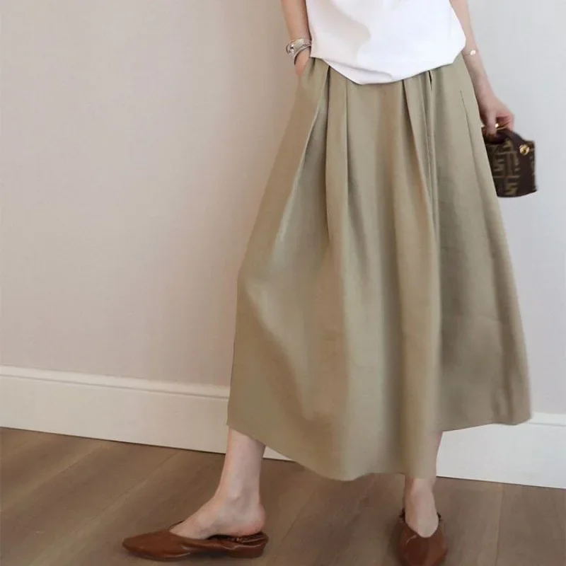 thumbnail image 1 of Primavera Verano 2024 Nueva Moda Femenina Recomendada BI Entrada Universal Amigable Falda de Arco de Longitud Media Lo que Usas Se Ve Bien, 1 of 5