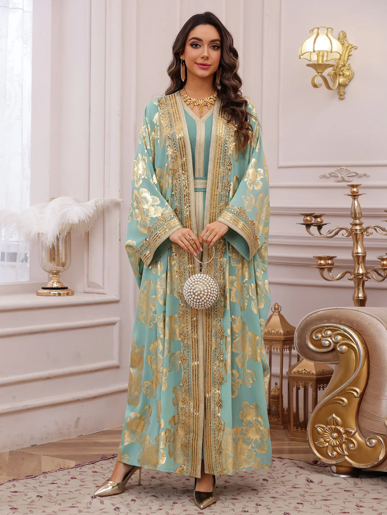جلابية تركواز طويلة بتطريز ذهبي فاخر