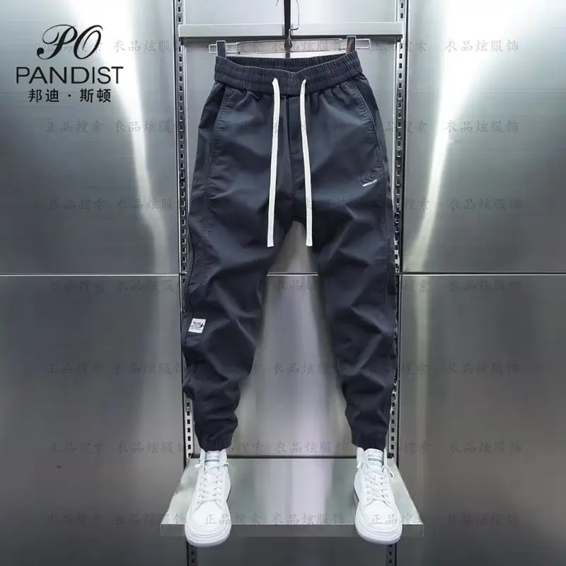 Spring Autumn Solid Color Fashion Elastic Waist Haren Pants Man Korean Style High Street Pockets Patchwork Drawstring Trousers