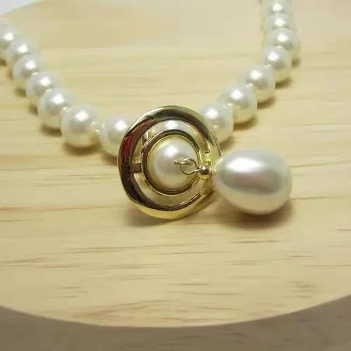 

Saturn logo engraved bottom 2.0*5.0cm Saturn pearl beads water drop earrings for girls planet ear drops