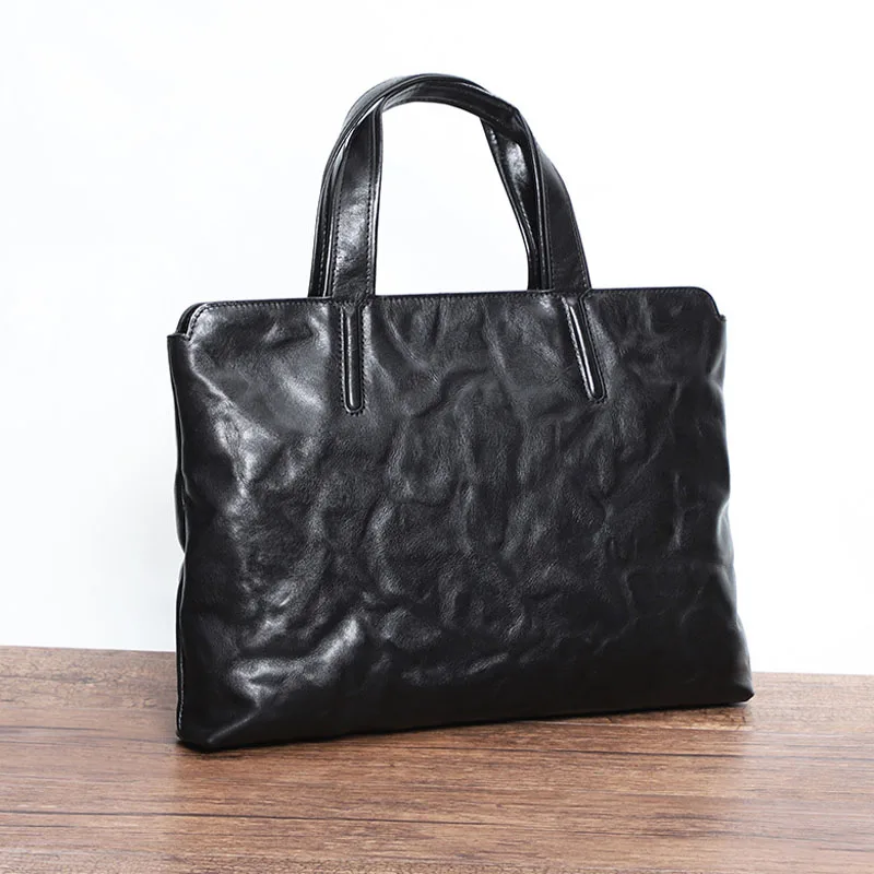 

EUMOAN Men's bag leather men's handbag Korean version men's business document Baotou layer cowhide computer bag single shoulder