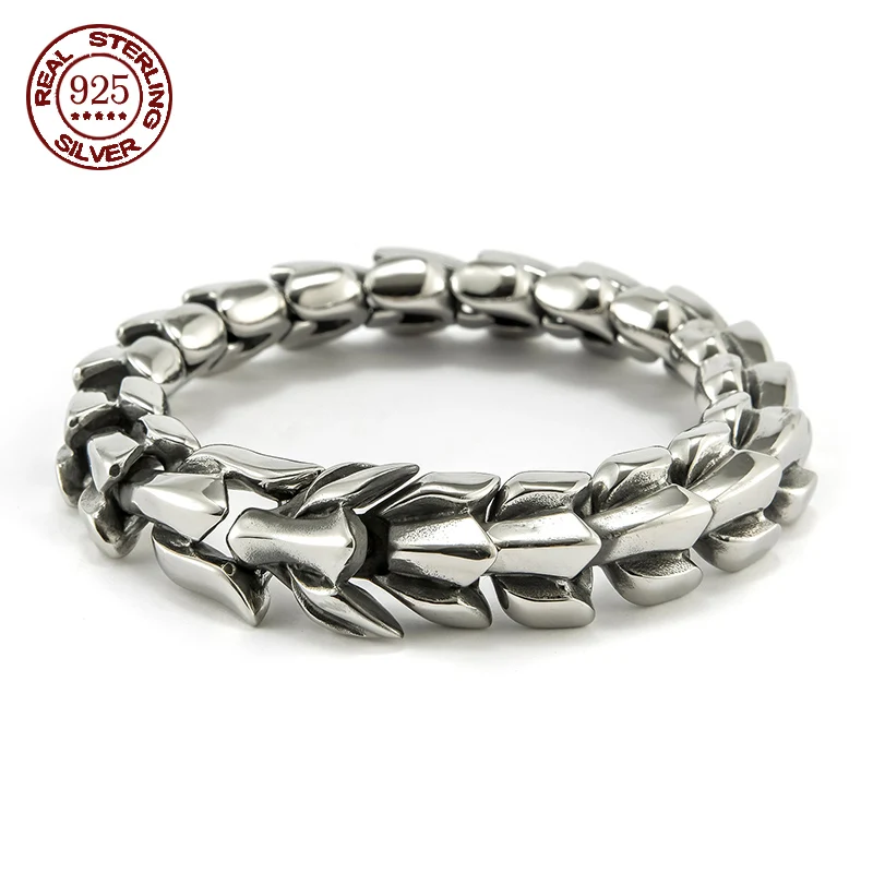 

Браслет мужской/женский из серебра 100% пробы с викингом