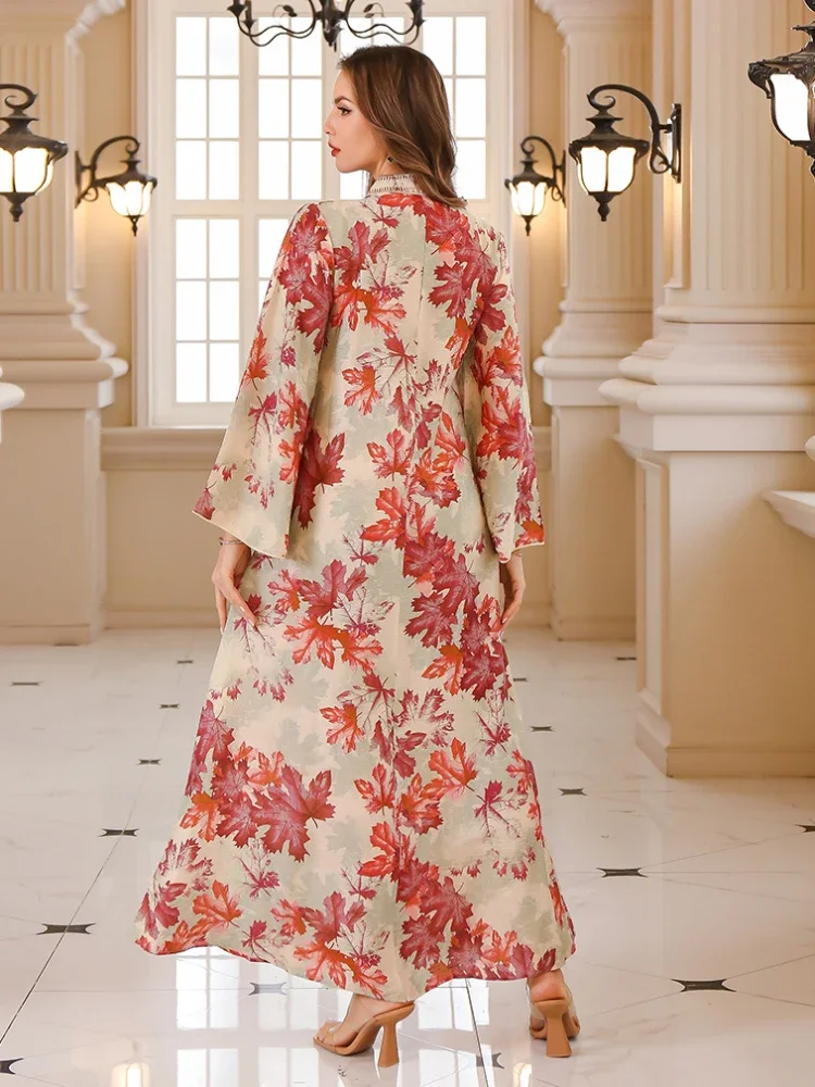 جلابية بيج فاتح بنقشة أوراق برتقالية