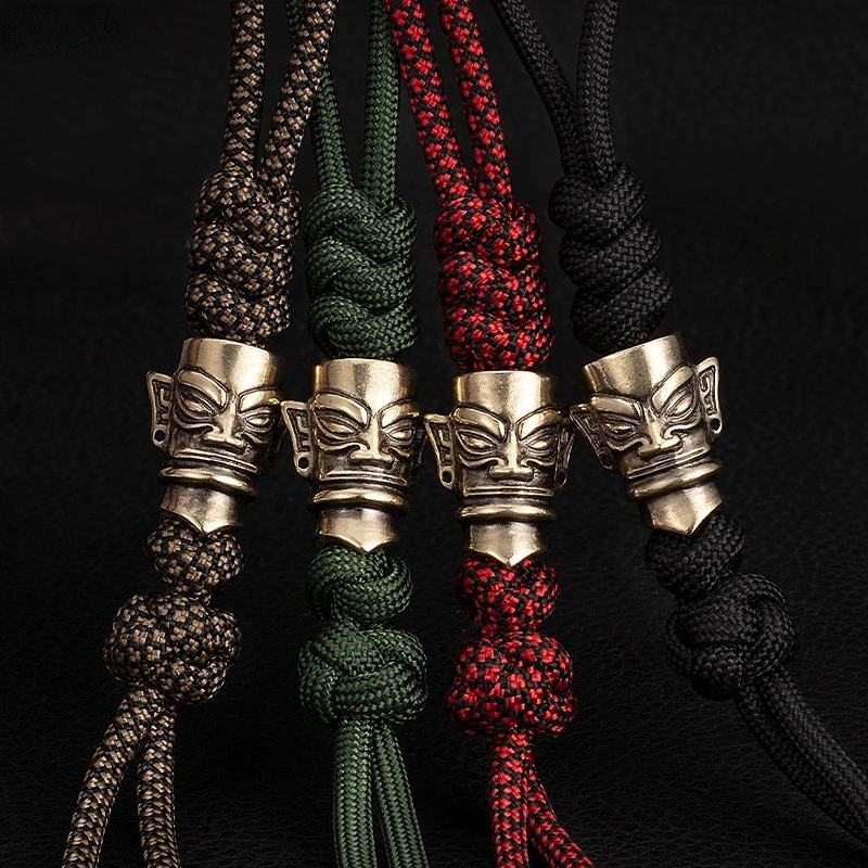 

Sanxingdui Hand-Woven Pendant Retro Personalized EDC Parachute Cord Hand Strap Package Pendant Keychain DIY