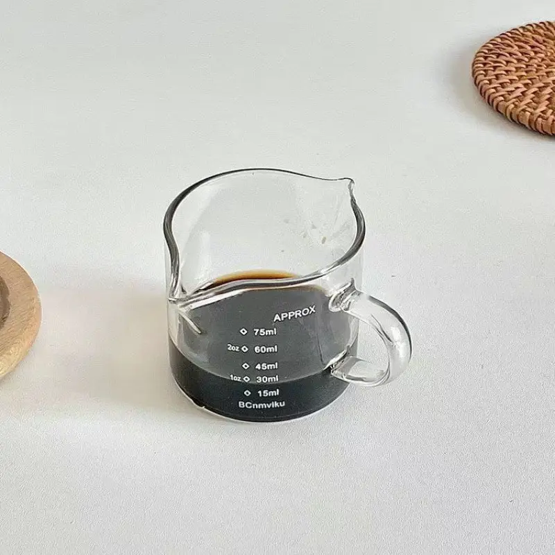 https://ae01.alicdn.com/kf/S8099241a5d8f402f952d9c7ba73da8f6Z/Glass-Measuring-Cup-Wood-Handle-Glass-Espresso-Measuring-Cup-Single-Milk-Coffee-Clear-Jug-Coffee-Supplies.jpg