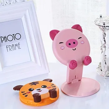 Supporti per cellulari a forma di animali dei cartoni animati, supporti da tavolo pieghevoli per telefoni cellulari, graziosi supporti per iPhone.