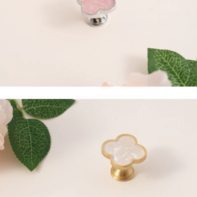 brushed brass cabinet knob clover design detail