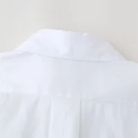 UNIZERA 2024 Summer New Women's Fashion Style Polo Collar Long Sleeves Asymmetric Hem Flower and Jewelry Decorative Shirt 5